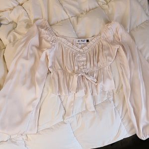 Light pink long sleeved blouse, size large.